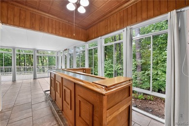 Nestled on a wooded golf course lot in the sought-after - photo 50