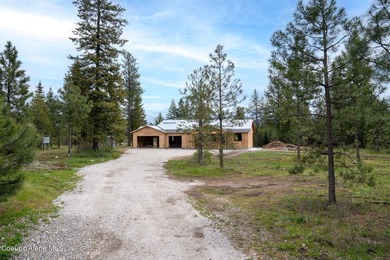 This beautiful single-level home on almost 5 acres is all about - photo 1
