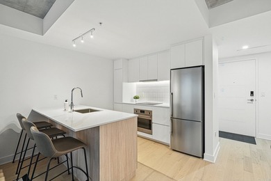 Decouvrez la vie au bord du canal de Lachine dans ce condo cle - photo 3