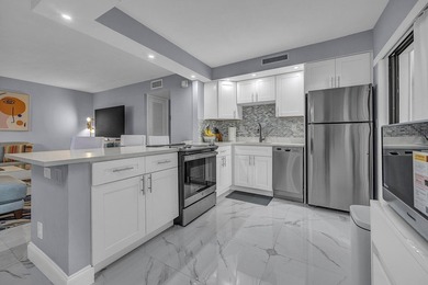 Completely updated first floor 2 bedroom, 2 bath residence in - photo 1