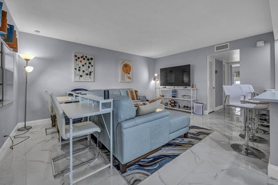 Completely updated first floor 2 bedroom, 2 bath residence in - photo 3