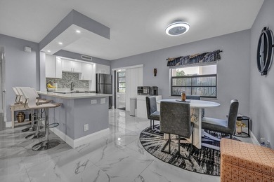 Completely updated first floor 2 bedroom, 2 bath residence in - photo 5
