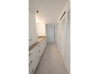 Enjoy beautiful lake views from this bright and inviting - photo 17