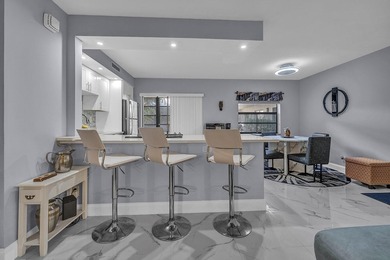 Completely updated first floor 2 bedroom, 2 bath residence in - photo 7
