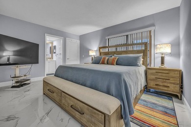 Completely updated first floor 2 bedroom, 2 bath residence in - photo 8