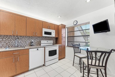 Beautiful first-floor 2-bedroom, 2-bath lakefront condo located - photo 4