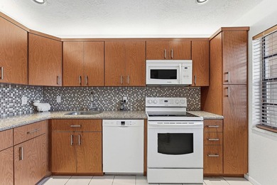 Beautiful first-floor 2-bedroom, 2-bath lakefront condo located - photo 5