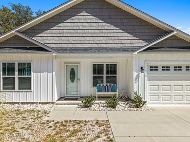 Welcome to 158 NW 1st St, a beautifully crafted low maintenance - photo 3