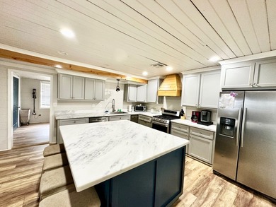 Discover serenity and comfort at our newly remodeled lakeside - photo 5