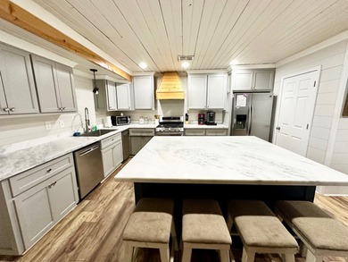 Discover serenity and comfort at our newly remodeled lakeside - photo 6