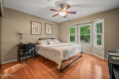 Tucked away on over an acre of wooded privacy with marsh views - photo 12