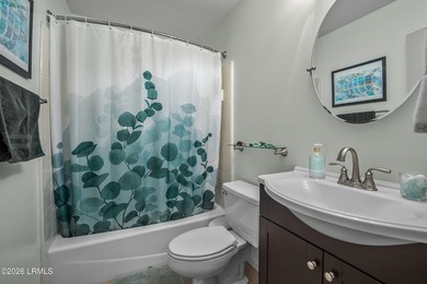 Tucked away on over an acre of wooded privacy with marsh views - photo 13