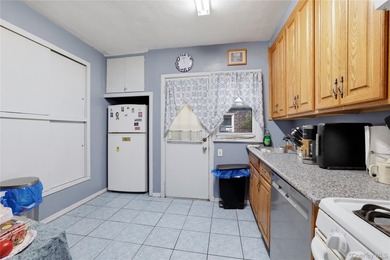 Charming brick home in tree-lined Oakland Gardens. This - photo 13