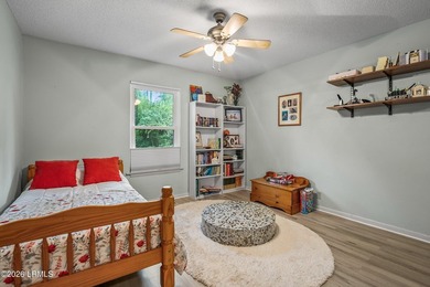 Tucked away on over an acre of wooded privacy with marsh views - photo 14