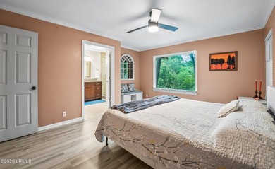 Tucked away on over an acre of wooded privacy with marsh views - photo 16