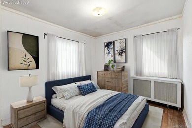 Charming brick home in tree-lined Oakland Gardens. This - photo 17