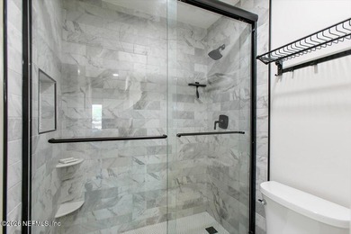 WHERE MODERN DESIGN MEETS WATERFRONT PERFECTION! Welcome to this