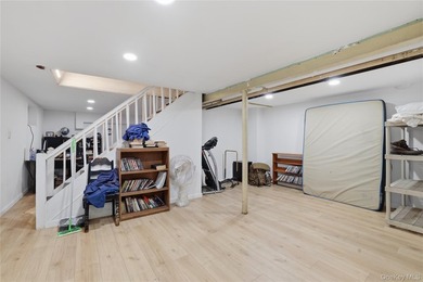 Charming brick home in tree-lined Oakland Gardens. This - photo 22