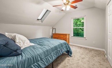 Tucked away on over an acre of wooded privacy with marsh views - photo 25