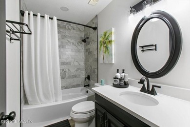 WHERE MODERN DESIGN MEETS WATERFRONT PERFECTION! Welcome to this