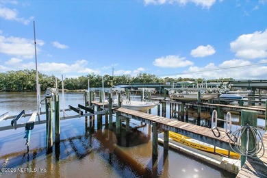 WHERE MODERN DESIGN MEETS WATERFRONT PERFECTION! Welcome to this