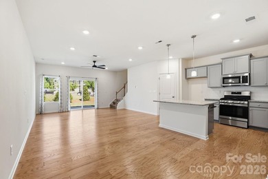 Welcome Home to this BETTER THAN NEW move-in ready townhome in - photo 2