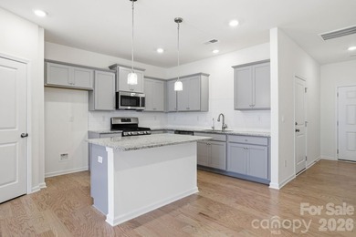 Welcome Home to this BETTER THAN NEW move-in ready townhome in - photo 5