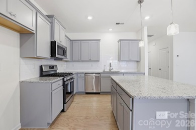 Welcome Home to this BETTER THAN NEW move-in ready townhome in - photo 7