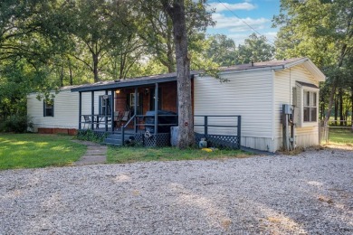 Lake Home For Sale in Log Cabin, Texas