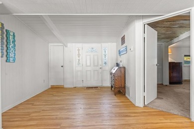 Experience refined lakefront living in this rare waterfront - photo 3