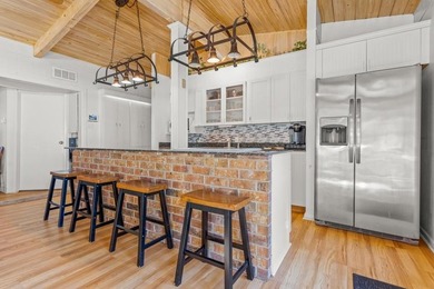 Experience refined lakefront living in this rare waterfront - photo 9