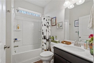 This refined ranch-style residence in Calhoun offers an