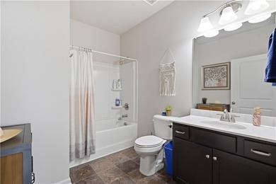 This refined ranch-style residence in Calhoun offers an