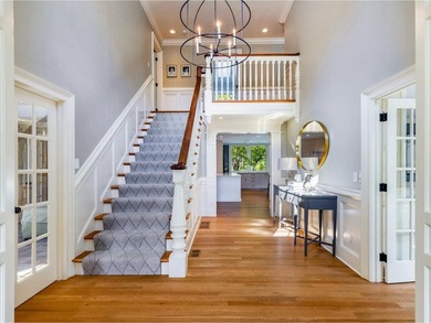 Step inside this timeless 6,000+ SF home where classic New - photo 5