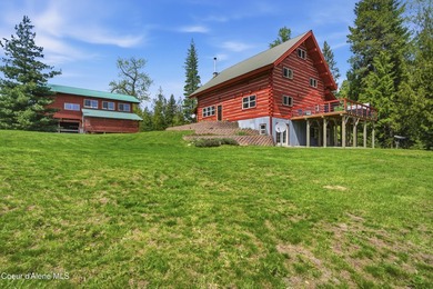 Escape to this mountain sanctuary located in Sagle, Idaho. This - photo 4