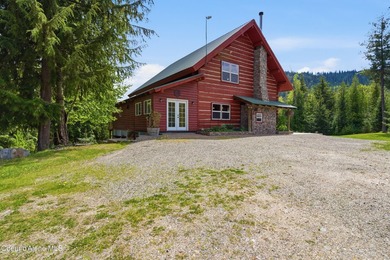 Escape to this mountain sanctuary located in Sagle, Idaho. This - photo 10