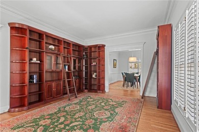 This beautiful brick traditional, majestically set back on the