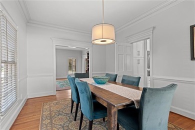 This beautiful brick traditional, majestically set back on the