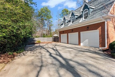 This beautiful brick traditional, majestically set back on the