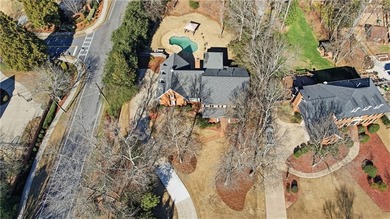 This beautiful brick traditional, majestically set back on the