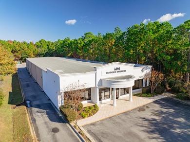 Exceptional freestanding retail building oriented in a prime - photo 1