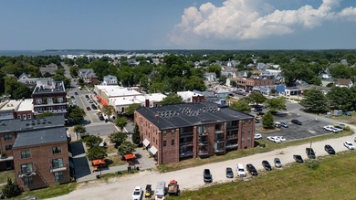 Location..location..location..Corner unit condo w/1400 sq ft on