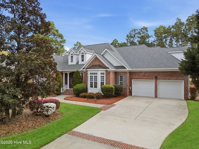 Stunning custom brick home located on the 18th hole of the - photo 3