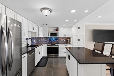 Rare opportunity to own a 3rd-floor end unit in the gated - photo 16