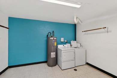 Rare opportunity to own a 3rd-floor end unit in the gated - photo 27