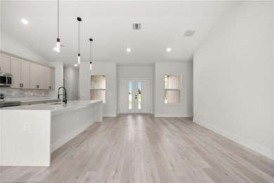 As you arrive, the clean architectural lines and spacious - photo 12