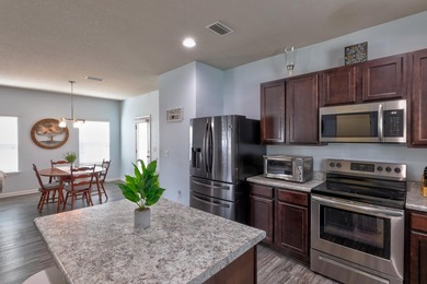 Welcome to this beautiful 4-bedroom, 3-bath home located in the - photo 17