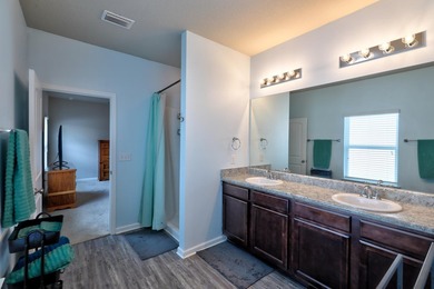 Welcome to this beautiful 4-bedroom, 3-bath home located in the - photo 25