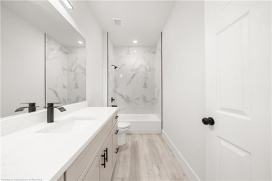 As you arrive, the clean architectural lines and spacious - photo 32