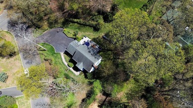 Nestled on a secluded, lushly landscaped three-quarter-acre - photo 44